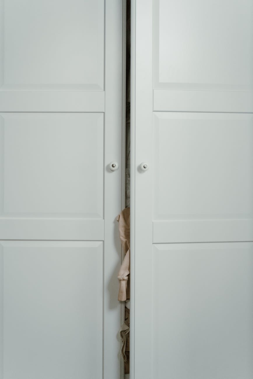 Custom closet organization with modular shelving and drawer systems