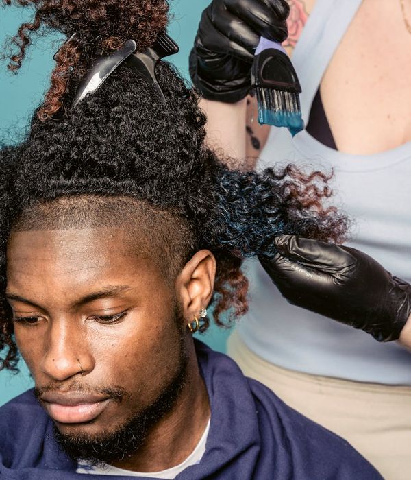 Man lighting specialist with professional equipment