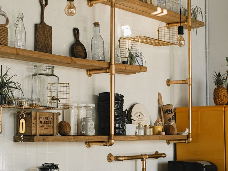 Modern kitchen interior with layered LED and pendant lighting design